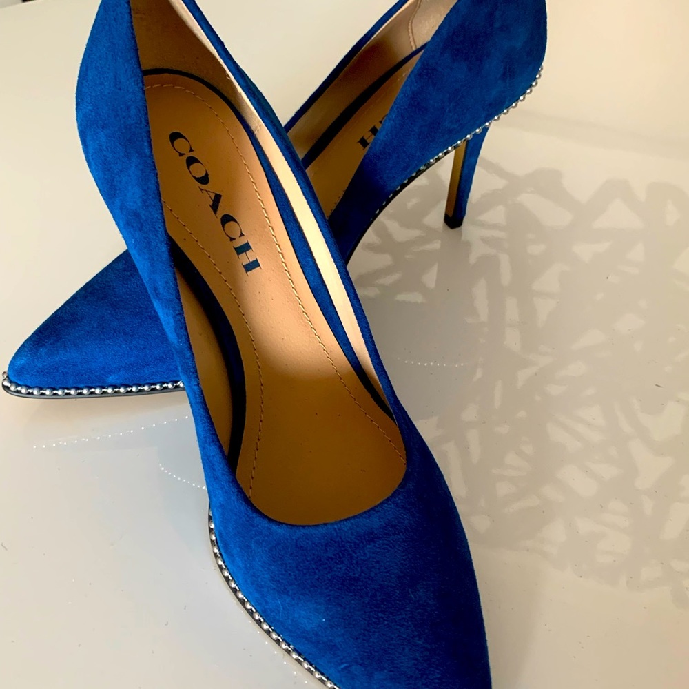 Coach heels. Never worn. Rich royal blue suede with riveted trim.